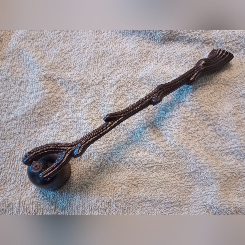 Natural wood style candle snuffer